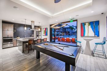 pool table and demonstration kitchen at Pulse